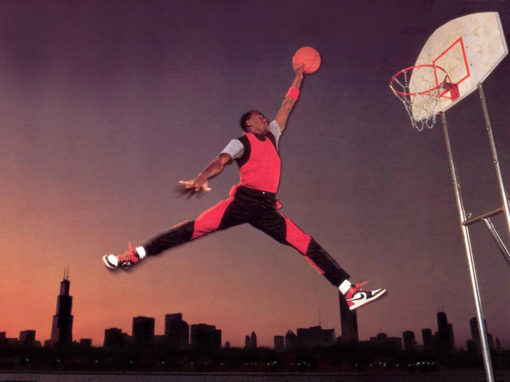 Michael Jordan photographed in campaign for Air Jordan 1 doing what would later be known as the "Jumpman pose"