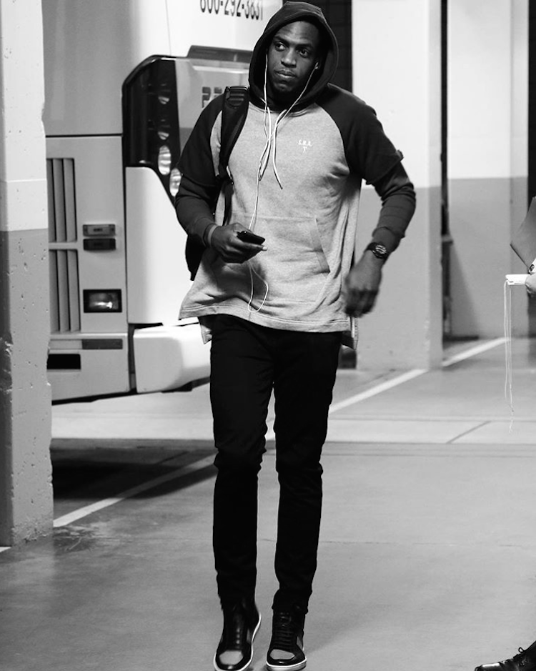 Milwaukee Bucks' Khris Middleton in a pair of Saint Laurent Hi-Top Sneakers