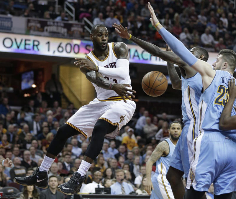 LeBron James passing the ball in a Nike LeBron 13 PE