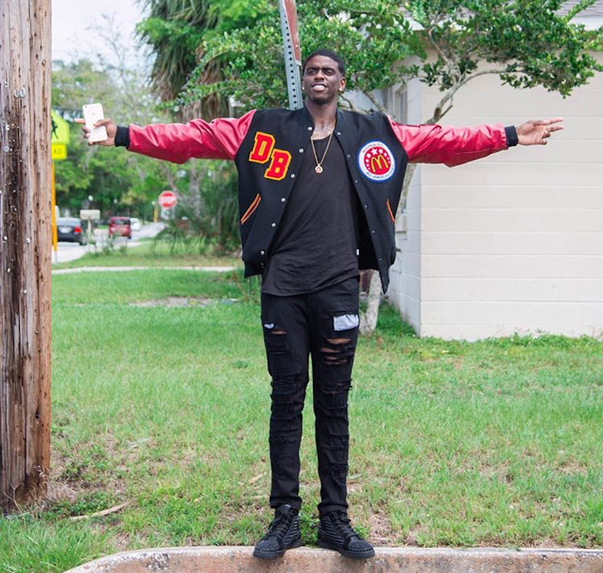 Florida State's Dwayne Bacon in a pair of Christian Louboutin Hi-Top Sneakers