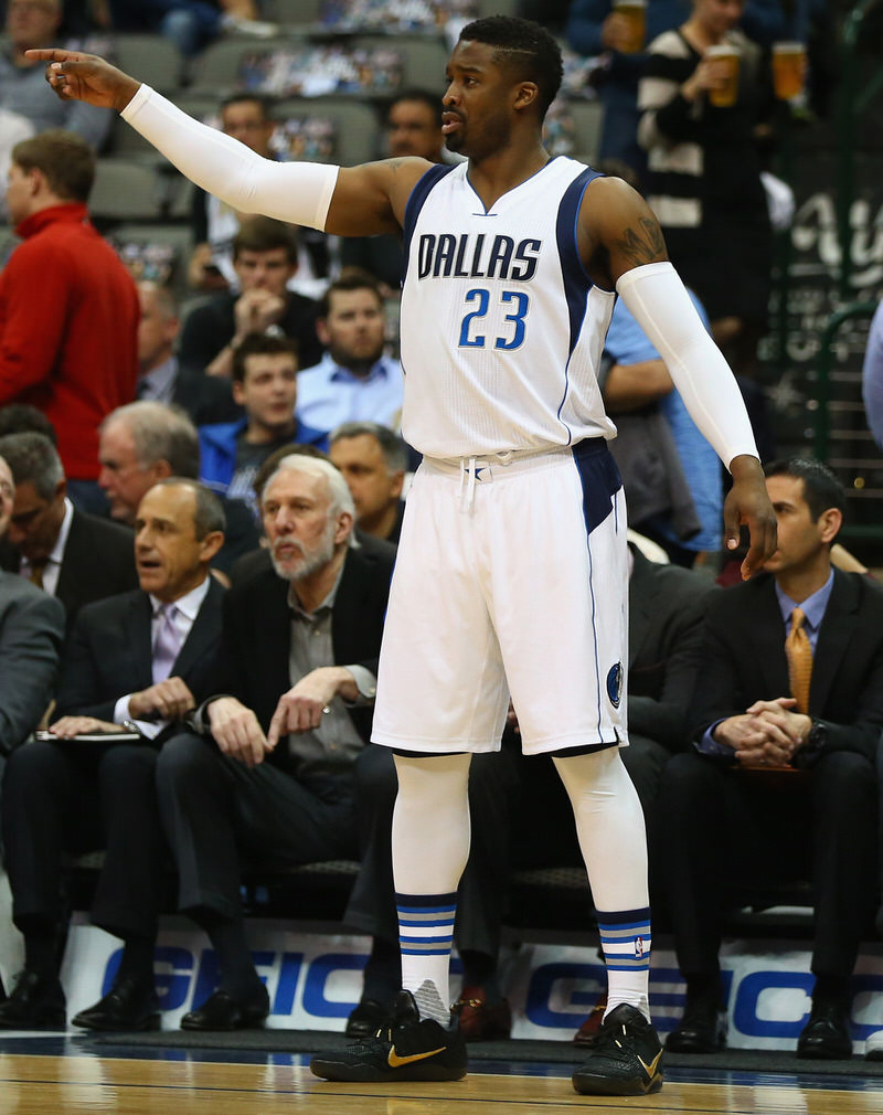 DALLAS, TX - APRIL 13:  Wesley Matthews #23 of the Dallas Mavericks during play against the San Antonio Spurs at American Airlines Center on April 13, 2016 in Dallas, Texas.  NOTE TO USER: User expressly acknowledges and agrees that, by downloading and or using this photograph, User is consenting to the terms and conditions of the Getty Images License Agreement.  (Photo by Ronald Martinez/Getty Images)