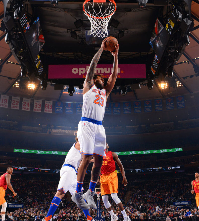 Derrick Williams grabbing a board in the Nike Zoom Kobe III "Fade to Black"