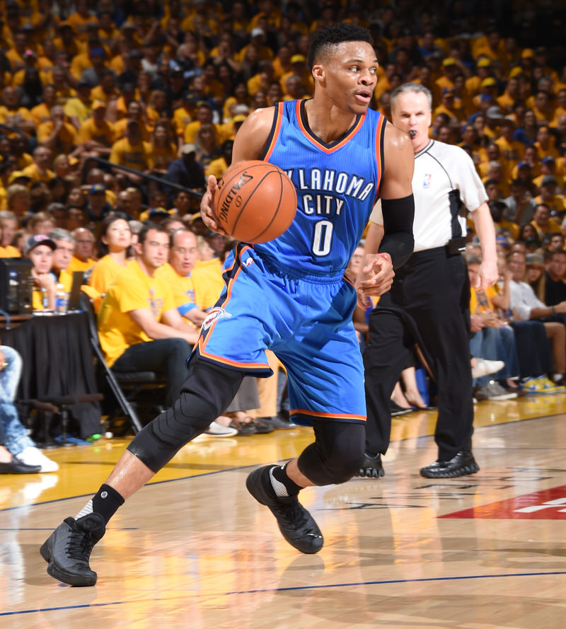 OAKLAND, CA - MAY 30: Russell Westbrook #0 of the Oklahoma City Thunder drives to the basket against the Golden State Warriors during Game Seven of the Western Conference Finals during the 2016 NBA Playoffs on May 30, 2016 at ORACLE Arena in Oakland, California. NOTE TO USER: User expressly acknowledges and agrees that, by downloading and or using this Photograph, user is consenting to the terms and conditions of the Getty Images License Agreement. Mandatory Copyright Notice: Copyright 2016 NBAE (Photo by Andrew Bernstein/NBAE via Getty Images)