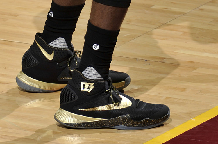 CLEVELAND, OH - JUNE 8: Draymond Green #23 of the Golden State Warriors prepares to shoot a free throw against the Cleveland Cavaliers in Game Three of the 2016 NBA Finals on June 8, 2016 at The Quicken Loans Arena in Cleveland, Ohio. NOTE TO USER: User expressly acknowledges and agrees that, by downloading and or using this photograph, user is consenting to the terms and conditions of Getty Images License Agreement. Mandatory Copyright Notice: Copyright 2016 NBAE (Photo by David Liam Kyle/NBAE via Getty Images)