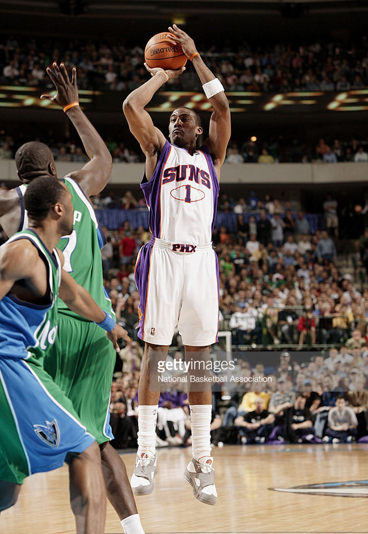 DALLAS - MARCH 14: Amare Stoudemire #1 of the Phoenix Suns takes a jump shot over DeSagana Diop #7 of the Dallas Mavericks at American Airlines Center on March 14, 2007 in Dallas, Texas. The Suns won 129-127 in double overtime. NOTE TO USER: User expressly acknowledges and agrees that, by downloading and/or using this Photograph, user is consenting to the terms and conditions of the Getty Images License Agreement. Mandatory Copyright Notice: Copyright 2007 NBAE (Photo by Garrett Ellwood/NBAE via Getty Images) *** Local Caption *** Amare Stoudemire