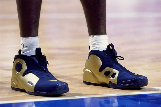 SYDNEY - SEPTEMBER 30: Kevin Garnett of the United States National Team shows off his sneakers against the French National team during the 2000 Summer Olympics played September 30, 2000 in Sydney, Australia. NOTE TO USER: User expressly acknowledges that, by downloading and or using this photograph, User is consenting to the terms and conditions of the Getty Images License agreement. Mandatory Copyright Notice: Copyright 2000 NBAE (Photo by Nathaniel S. Butler/NBAE via Getty Images)