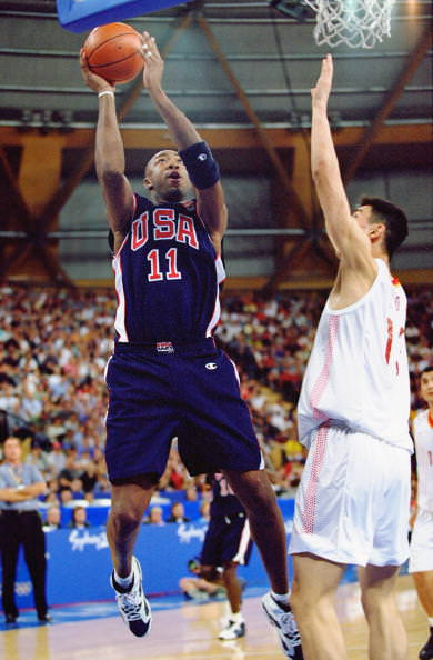 17 Sep 2000: Vin Baker of the USA up against Ming Yao of China during the Men's Basketball Preliminaries at the Sydney Superdome on Day Two of the Sydney 2000 Olympic Games in Sydney, Australia. Mandatory Credit: Jed Jacobsohn /Allsport