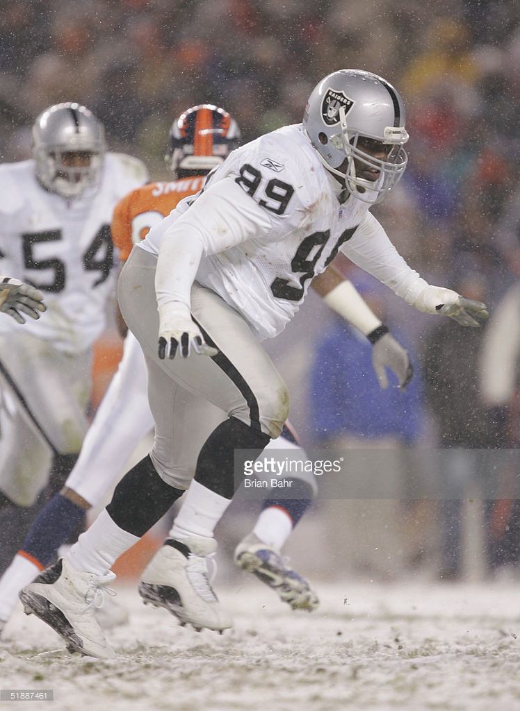 Warren Sapp in his Air Jordan 13 High PE