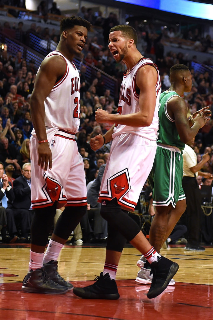 Jimmy Butler and Michael Kidd-Gilchrist celebrate in the Air Jordan XXX1 "Battle Grey" & Nike KD 2 "Triple Black," respectively