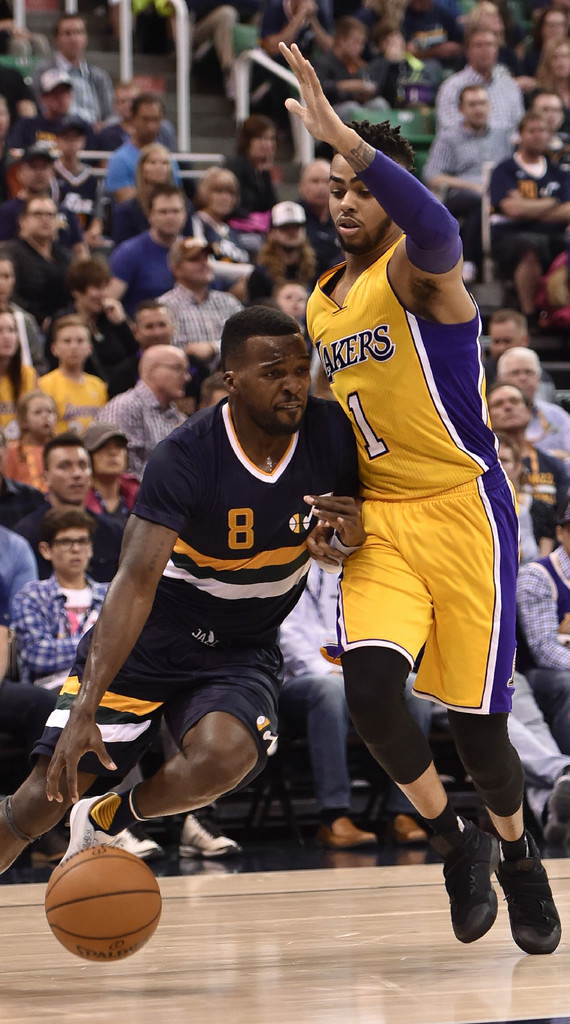 D'Angelo Russell defends in the Nike Kyrie 2 "Triple Black"