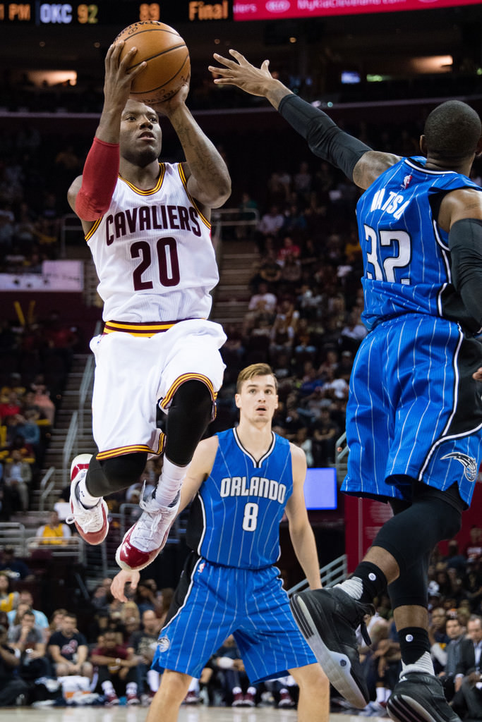 Kay Felder rises in the Air Jordan 11 Low "Cherry"