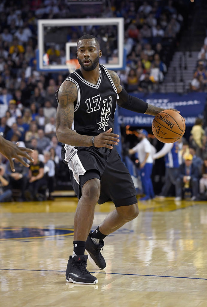 Jonathon Simmons surveys in the Air Jordan 12 "Neoprene"