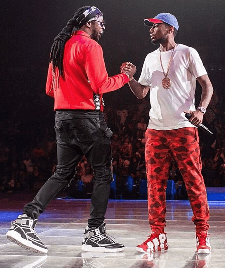 Fabolous pairs a plain tee and BAPE sweats with the Supreme x Nike Air More Uptempo.