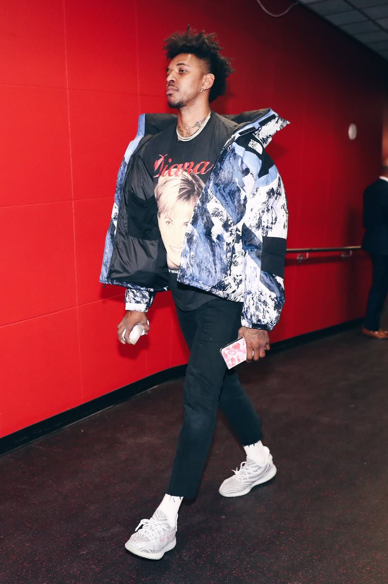 Swaggy P's look here is pretty icy.