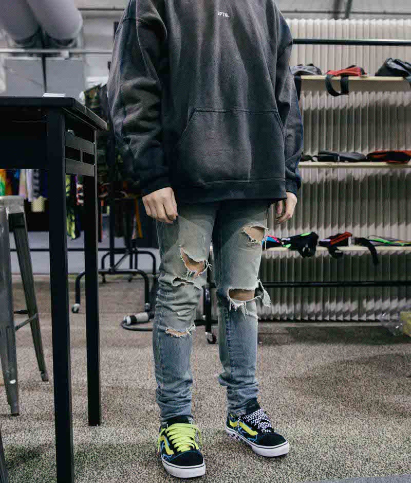 Oversized EPTM hoodie with Saint Laurent skinny jeans and Mindseeker Vans Old Skools.