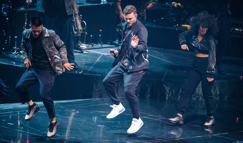 JT wears Paris Saint Germain Jordan Jordan jacket and Quai 54 3s.