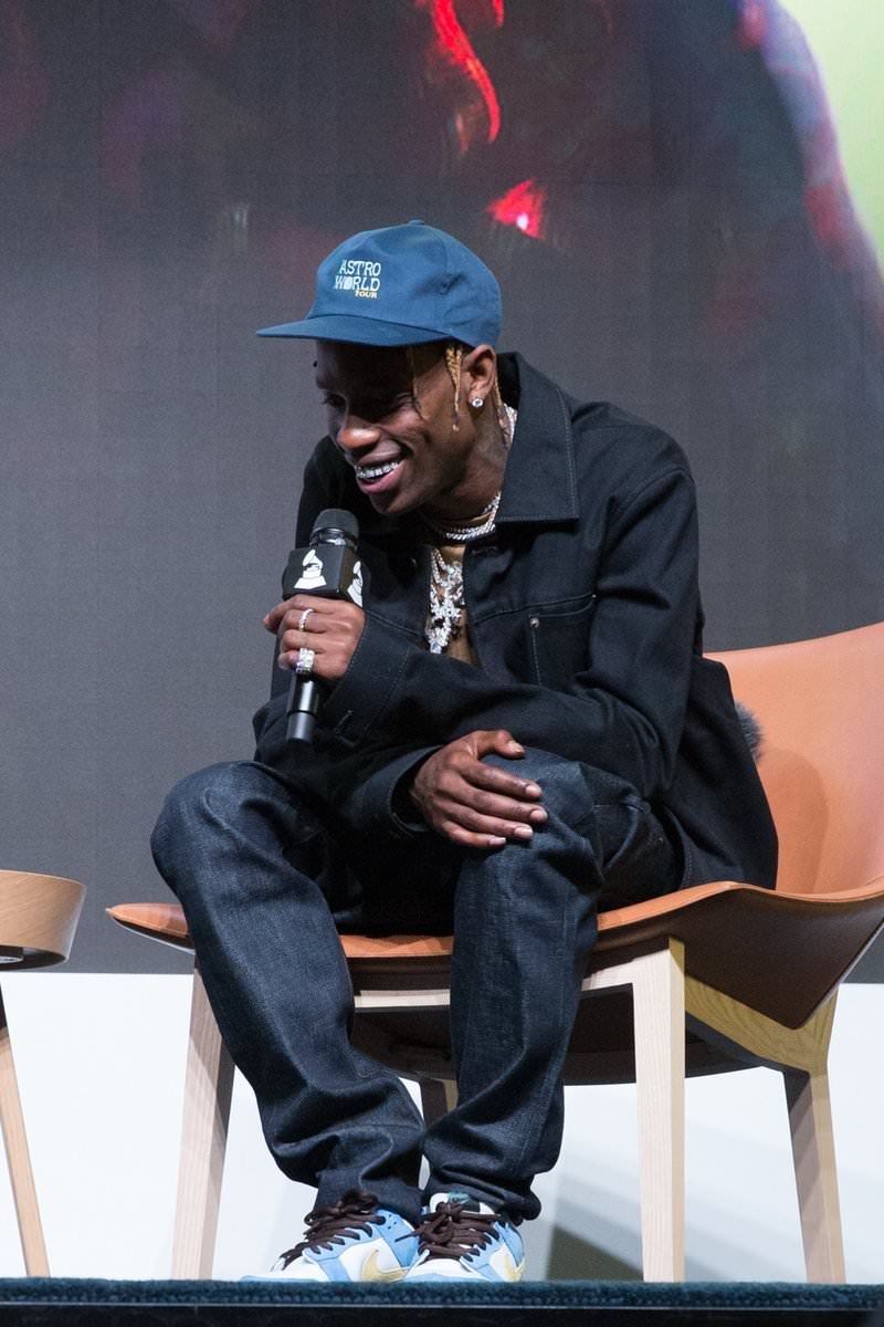 Travis Scott pairs like minded tones with his Homer SB Dunk Lows.