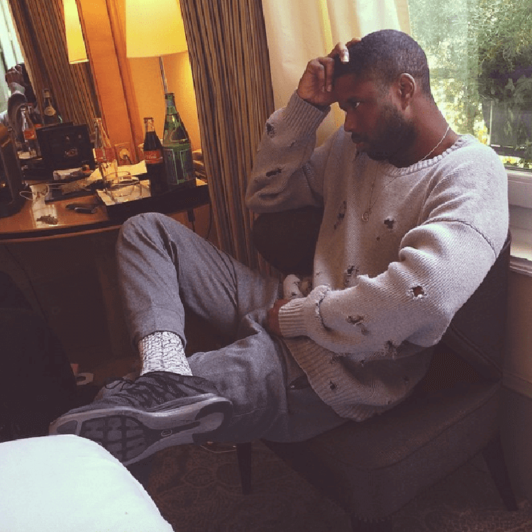 ASAP Twelvyy dresses up the Supreme x Nike Flyknit Lunar1+ with trousers and a textured sweater.