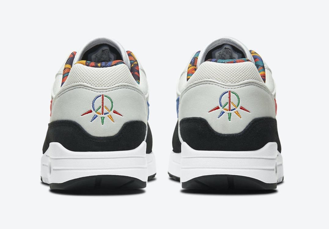 nike-air-max-1-peace-live-together-play-together-urban-jungle-gym-white-chile-red-photon-dust-astronomy-blue-university-gold-lucky-green-dc1478-100