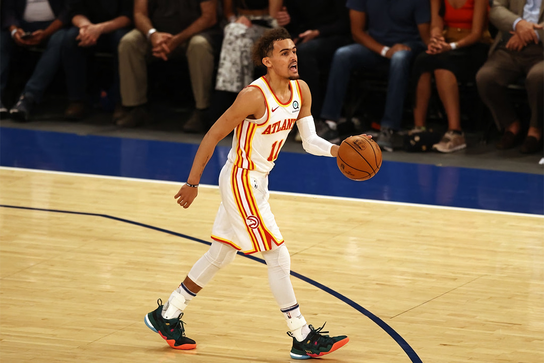 Trae Young in the Adidas Trae Young 1. Colorway inspired by the 1996 Olympics.